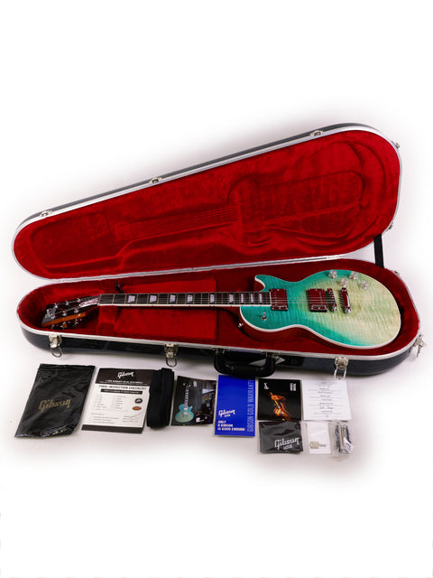 Detailed view of a 2019 Gibson Les Paul HP with several P-90 pickups, highlighting its custom shop design and quality.
