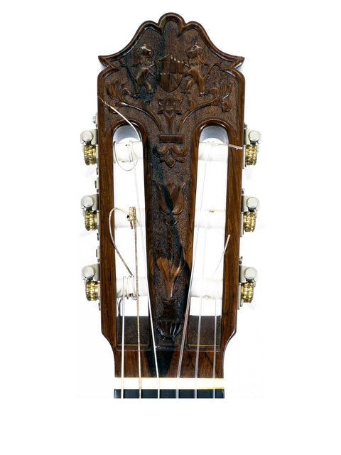 Detailed view of the headstock of a 1976 Nakade Master 30 Grand Concert Guitar, highlighting its craftsmanship and features.