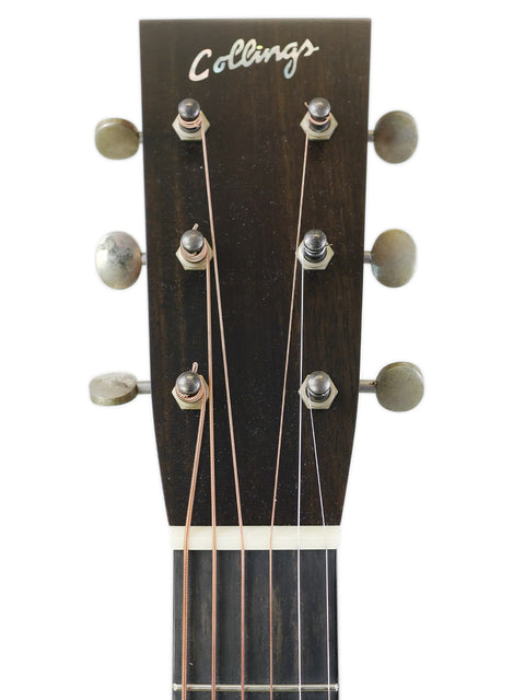 Detailed view of the neck of a 2020 Collings Julian Lage Signature OM1 acoustic guitar, highlighting the strings and design.