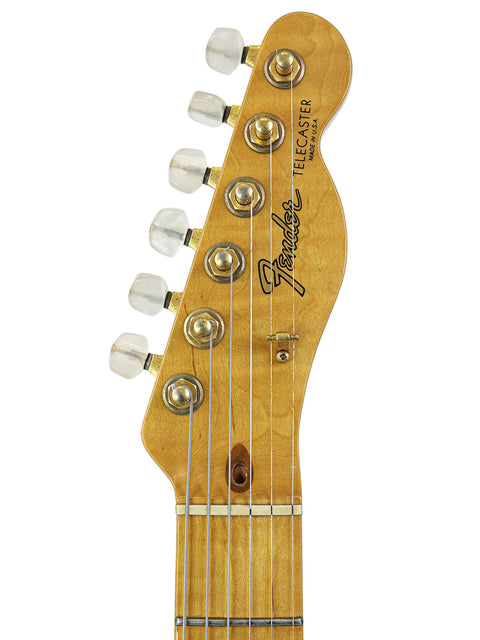 Detailed view of the neck of a Fender 40th Anniversary Telecaster, highlighting its design and limited edition features.