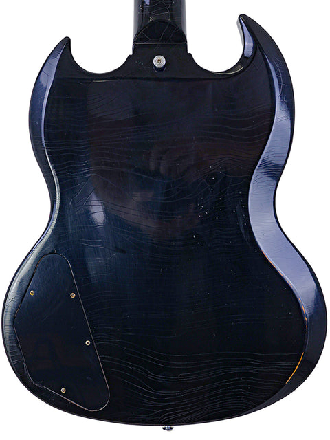 Elegant black Gibson Custom Shop '64 SG guitar with a black body and headstock, representing premium quality and style.