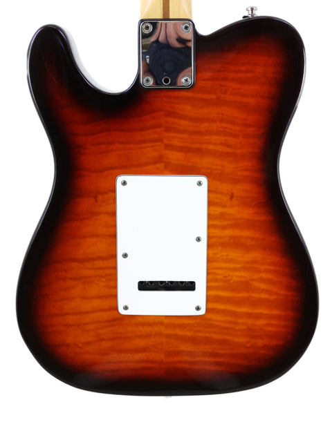 Fender Telecaster Plus Deluxe in sunburst finish, highlighting its iconic shape and rich color, made in the USA, 1992.