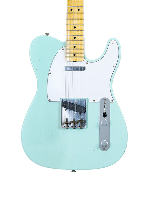 Green electric guitar with a white pickup, showcasing the Fender Custom Shop 60s Journeyman Telecaster from 2018.