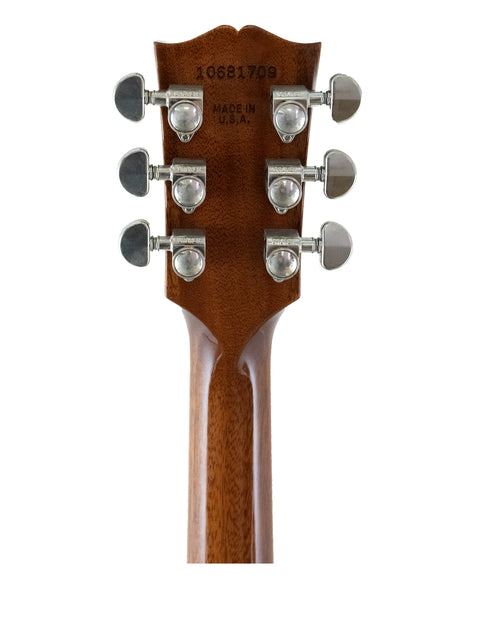 Headstock of a Gibson Custom ES-335 guitar featuring four knobs and a dot inlay, showcasing its elegant design.