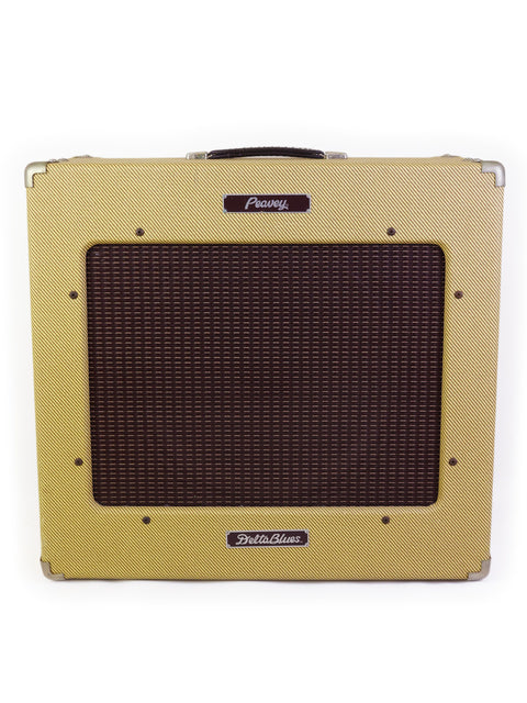 Image of a Fender Hot Rod Jr. 50W 2x12 combo amp next to a 2008 Peavey Delta Blues 115 Tweed guitar amp.