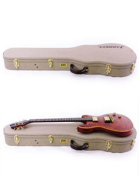 Inside a case, two guitars are displayed, identified as Jarrett Forza (Serial #00001) - USA 2007, emphasizing their quality.