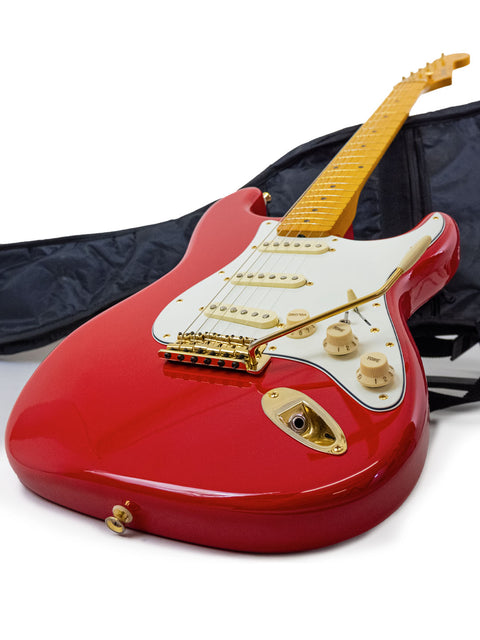 StrXX Partscaster – USA 2012: a striking red electric guitar nestled in its protective case, ready for the next jam session.