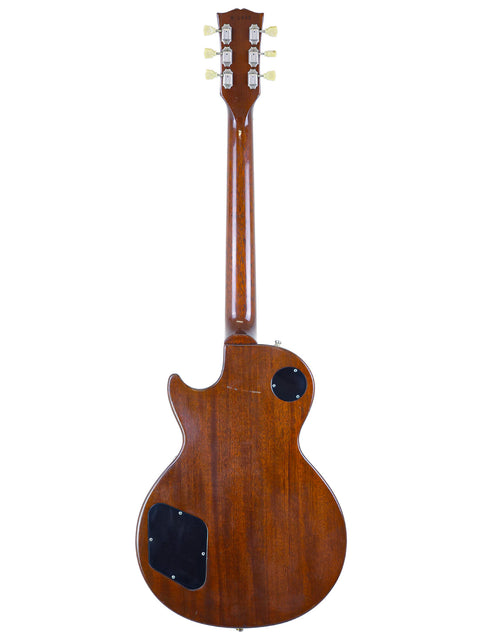 The Gibson Les Paul Classic in rich mahogany, highlighting its iconic shape and vintage charm from the 1960 Reissue, USA 1998.