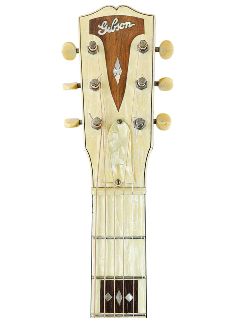 The iconic Gibson Les Paul Custom Shop guitar, L-C ‘Century of Progress’ from 1936, featuring elegant design and rich history.