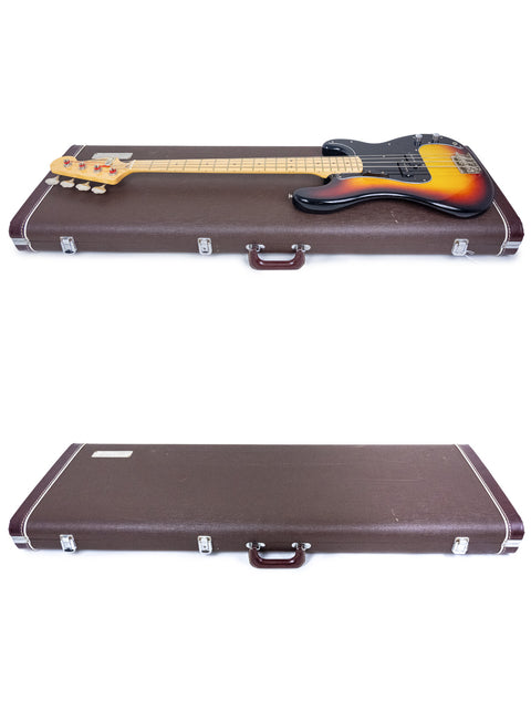 Two bass cases display a Fernandes P Bass from Japan (1978-81) alongside a guitar, emphasizing their musical heritage.