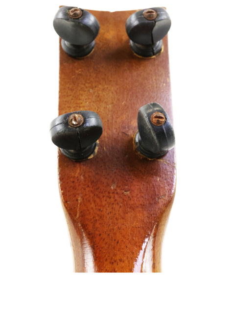 Vintage 1930s Weissenborn Miami Style 3 Koa Ukulele, featuring elegant curves and a rich, warm wood texture.