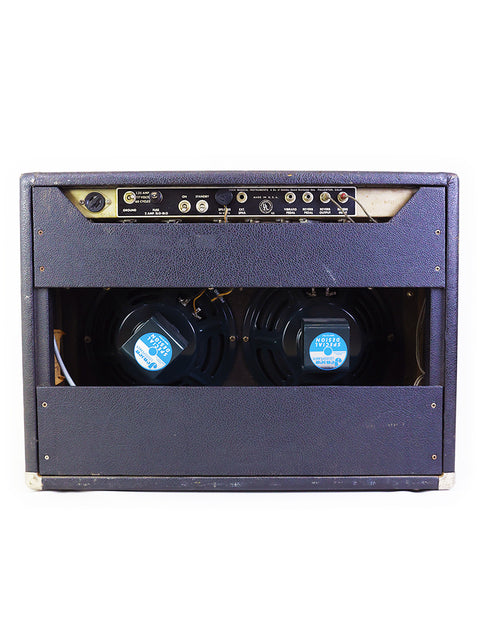 Vintage 1966 Fender Vibrolux Reverb amplifier with two speakers, showcasing classic black design and retro style.