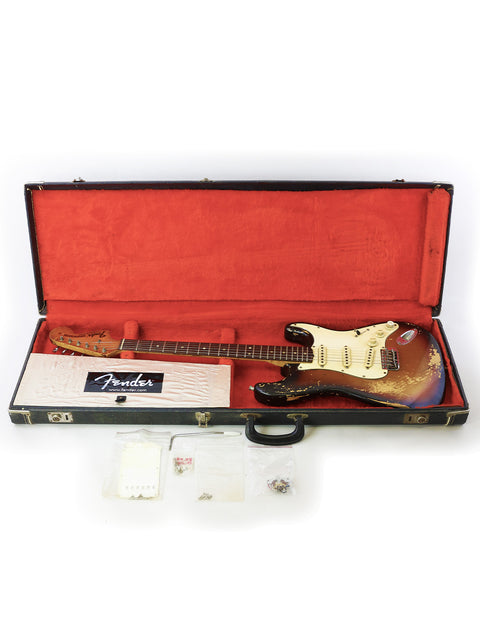Vintage Fender Stratocaster guitar from 1970, safely housed in a case, embodying the essence of rock and roll history.