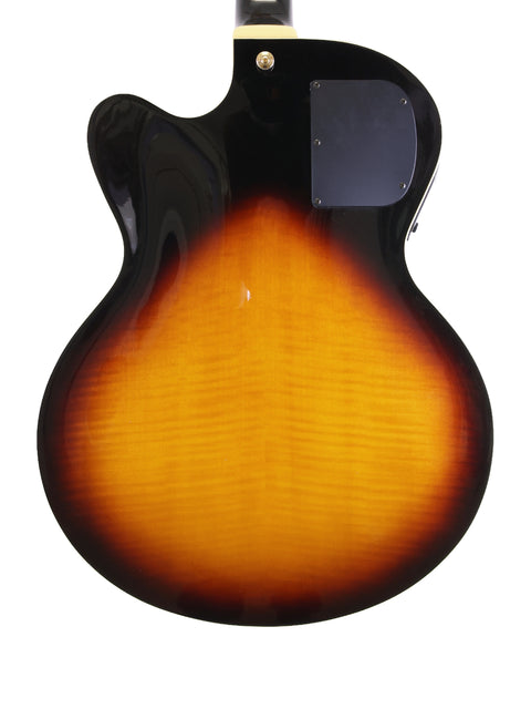 Yamaha AEX1500 guitar from 2004, showcasing a rich sunburst finish, beautifully crafted in Japan for music lovers.