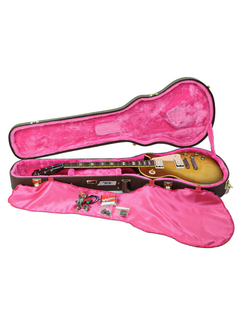 guitar case with pink lining holds a Gibson Les Paul Classic 1960 Reissue from 1998, showcasing its elegant design.