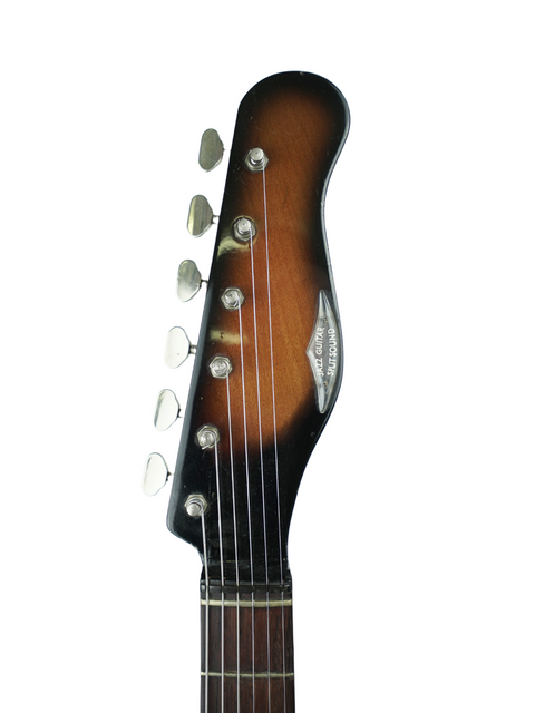 1964 Burns Split Sound guitar showcasing a warm brown body and a striking black headstock.