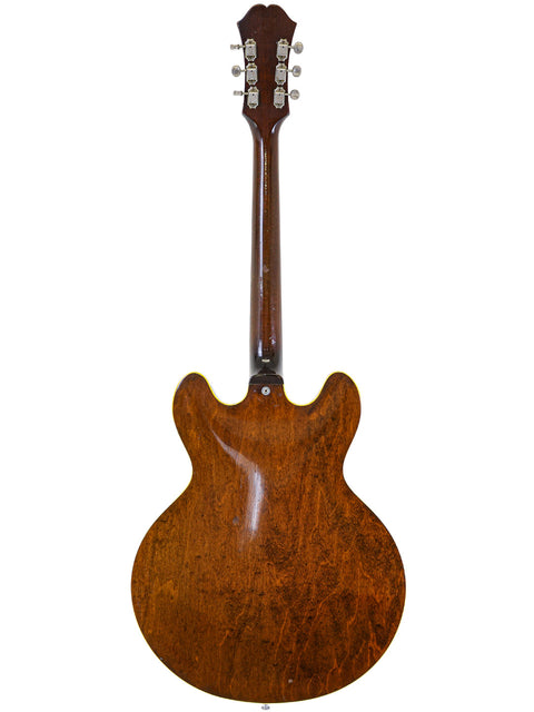 1965 Epiphone Casino guitar featuring a mahogany body and a warm brown finish, exemplifying vintage elegance.