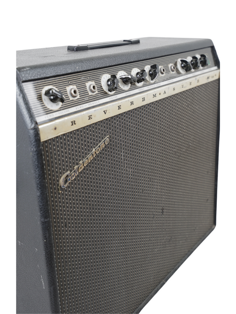 1966 Goldentone Reverbmaster Model 1755 amplifier in black and silver, set on a clean white background.