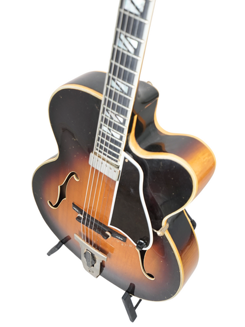 1966 vintage Gibson Johnny Smith guitar with a sunburst finish, once owned by Ike Isaacs and George Benson, showcasing classic design.