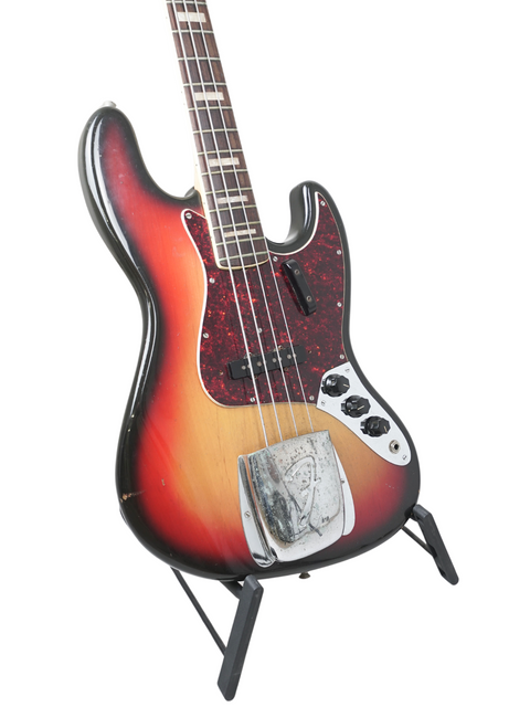 1972 USA Fender Jazz Bass guitar featuring a beautiful sunburst finish, perfect for any music lover or collector.