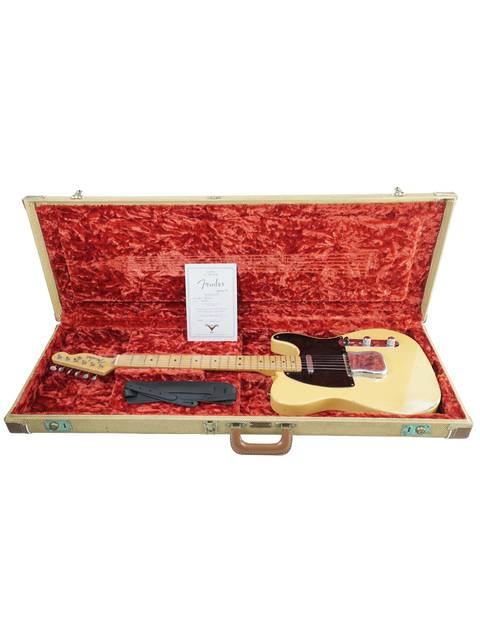 1998 Fender Custom Shop Cunetto Nocaster Relic guitar nestled in a case, adorned with a luxurious red velvet cover.

