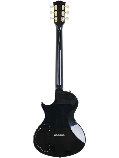 1999 Gibson Nighthawk electric guitar in black with a white pickguard, a must-have for any guitarist looking for elegance.
