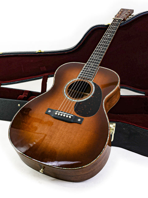 2019 Martin Custom Shop 000-42 guitar nestled in its case, highlighting the beautiful Guatemalan rosewood.