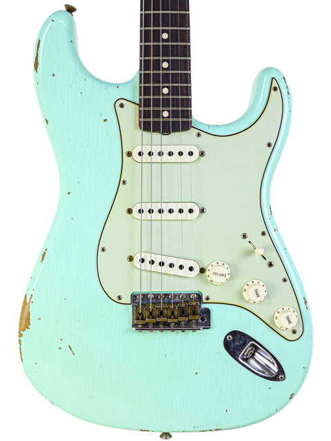 A mint green Fender Custom Shop Stratocaster, Master Built by Yuriy Shishkov, showcasing a 1959 relic design from 2020.