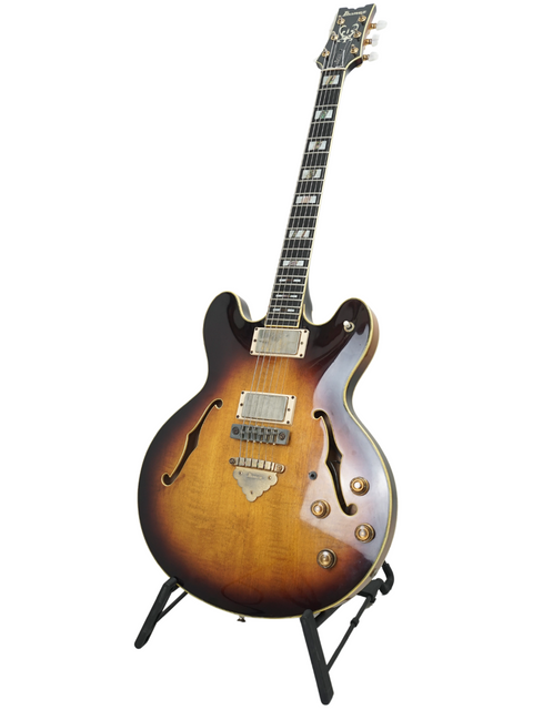 A 1979 Vintage Ibanez Artist 2630 guitar featuring a striking sunburst finish, highlighting its elegant craftsmanship.
