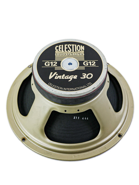 A Celestion Vintage 30 guitar speaker isolated on a white background.