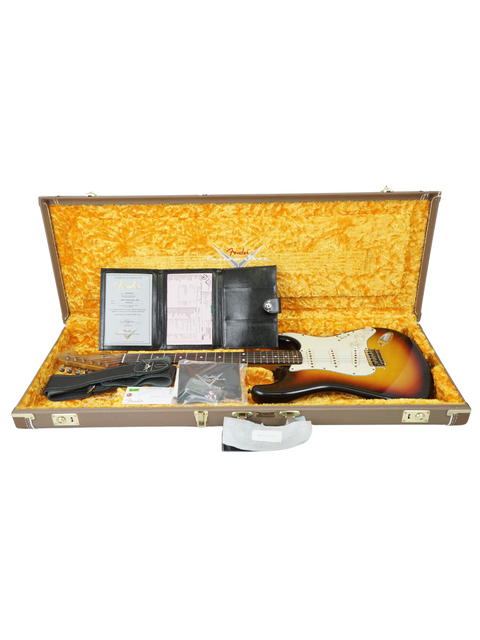 A Fender Custom Shop '60 Stratocaster Hardtail electric guitar nestled in a case, highlighting its classic craftsmanship.