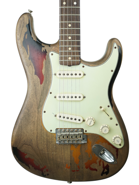 A Fender Custom Shop Rory Gallagher Signature Stratocaster with a uniquely painted body and neck, showcasing its relic finish.