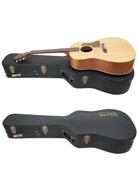 A Gibson J-35 guitar from 2013 and another guitar nestled in a case, highlighting their beauty and protection.