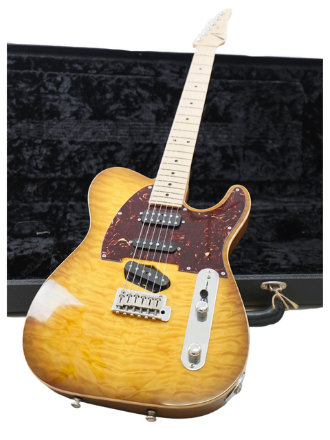 A beautiful Tom Anderson Hollow T Classic guitar from 2005, displayed next to its case, perfect for any music lover.