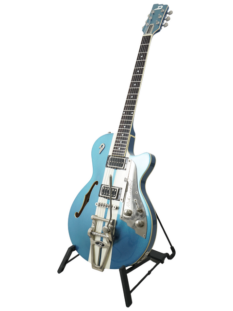 A blue semi-hollow electric guitar with a Bigsby tremolo on a black stand.