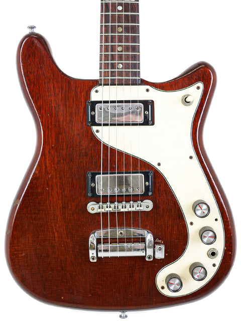 A brown 1966 Epiphone Wilshire guitar featuring a striking white pickguard, perfect for any music lover.