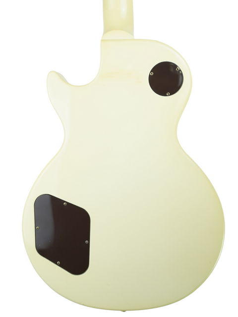 A classic 1989 Gibson Les Paul Standard electric guitar in Arctic White, complemented by a stylish black pickguard.