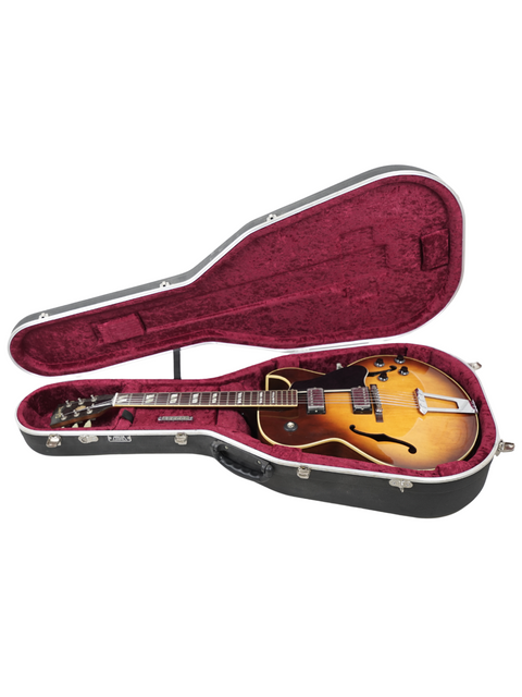 A classic guitar case opens to reveal a vintage 1986 Gibson ES-175, highlighting its elegant curves and rich history.