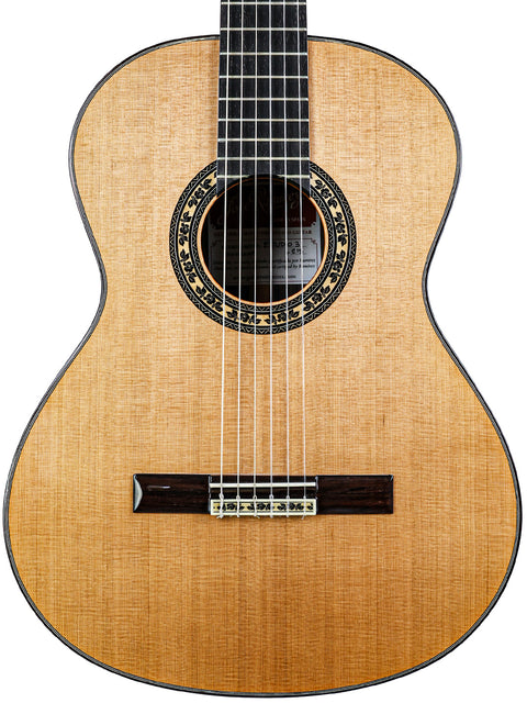 A close-up of a José Ramírez Estudio 3 classical guitar from Spain, showcasing its elegant design and craftsmanship.