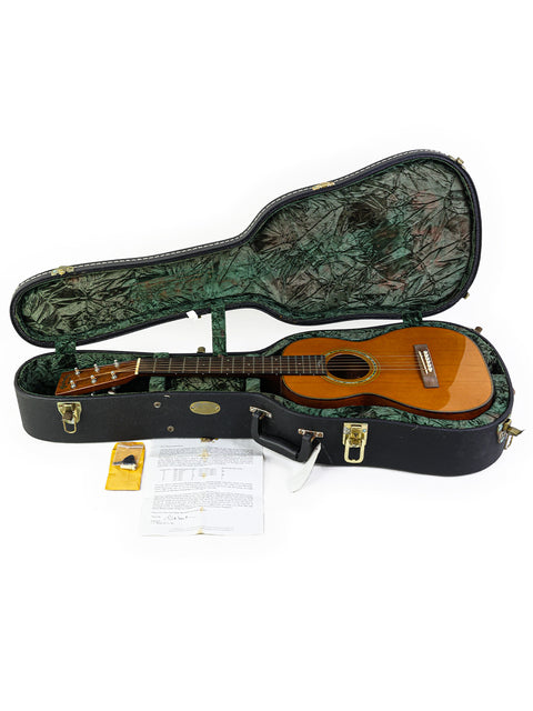  A guitar case containing a signed Martin Sting Mini Signature Edition guitar, #35 of 100, made in the USA, 2005.
