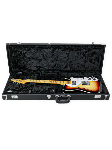 A guitar case with a Txxx Custom Thinline '72 Partscaster from 2022 resting inside, ready for its next gig.