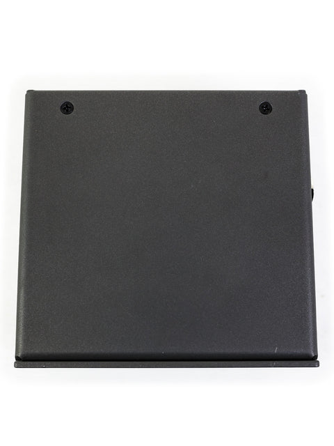  A minimalist black laptop case featured on a white surface, illustrating its chic design and utility for laptop storage.