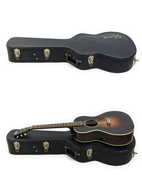 A pair of guitars in their cases on a white background, including a Gibson 30s L-00 True Vintage, USA, 2014 model.