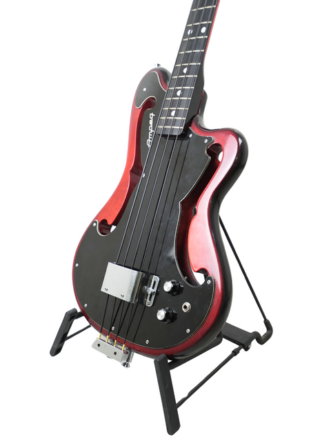 A red and black electric guitar resting on a stand, representing the iconic design of the 1966 Ampeg AEB-1 bass.