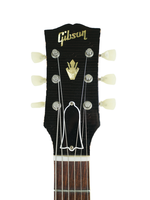 A stunning Gibson Les Paul Custom Shop guitar, featuring the Aged '59 Reissue from 2018, highlighting its vintage appeal.