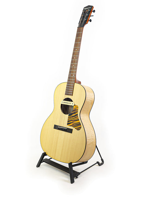 A stunning Waterloo WL-14 X Scissortail guitar displayed on a stand with a bright white backdrop.