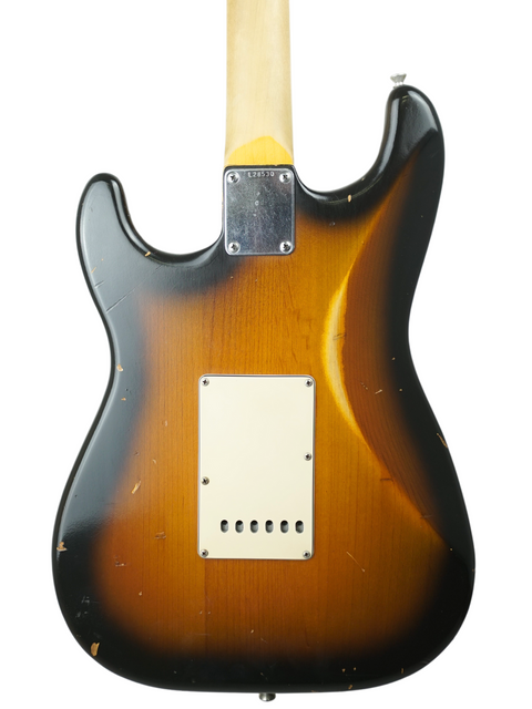 A stunning sunburst Fender Custom Shop Stratocaster, original model, paired with a 2009 Nash S63 Stratocaster Relic.