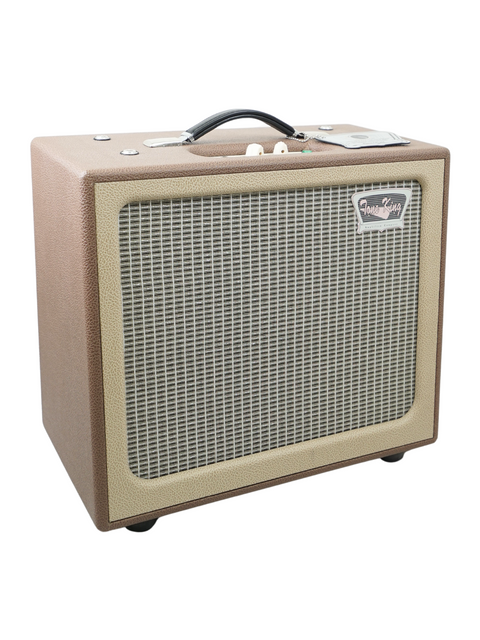 A stylish tan and beige guitar amplifier, the Tone King Gremlin 1 x 12" combo, ideal for any music lover's setup.
