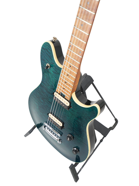 A vibrant green electric guitar, the Peavey EVH Wolfgang Standard Hardtail, displayed on a stand, highlighting its unique features.