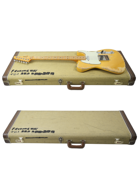 A white background showcases two guitars in a case, including a 2015 Suhr Classic T Antique Trans Butterscotch.